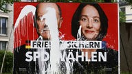 Beschmiertes SPD-Wahlplakat Scholz und Barley